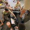 At Fort Huachuca, Arizona, Civil Air Patrol cadets learn how to ready wounded troops for transport. (Credit: Civil Air Patrol/2nd Lt. Mitch Smith)