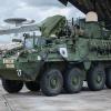 Soldiers and airmen offload Stryker combat vehicles deployed from I Corps at Joint Base Lewis-McChord, Washington, to Andersen Air Force Base, Guam, for an exercise. (Credit: U.S. Army/Spc. Jailene Bautista)