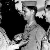 A 22-year-old Maj. Larimore receives the Distinguished Service Cross from Col. John Albright, post commander at Fort Myer, Virginia. (Credit: courtesy of Walt Larimore)