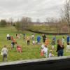 Children of Lexington VA employees hunt eggs.