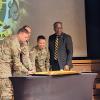 Commandant of NCOLCOE, Jason Schmidt cuts the Army birthday cake 